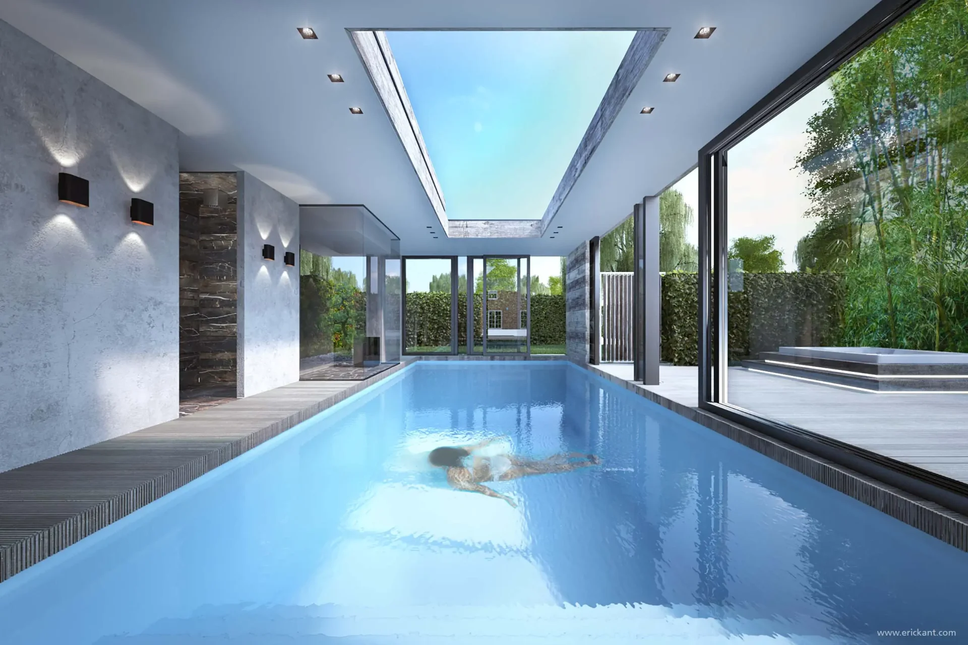 Interieur van het binnenzwembad in de Wellness Poolhouse door ERIC KANT met een grote centrale lichtstraat, betoncire wanden, moderne wandverlichting en zicht op de tuin en jacuzzi.