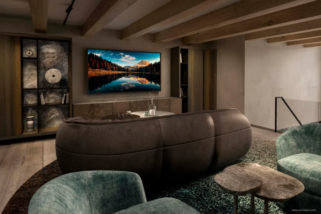 Luxe tv-lounge op de vide van een Amsterdams grachtenpand met een organische bank, velvet fauteuils en maatwerk kasten door ERIC KANT.